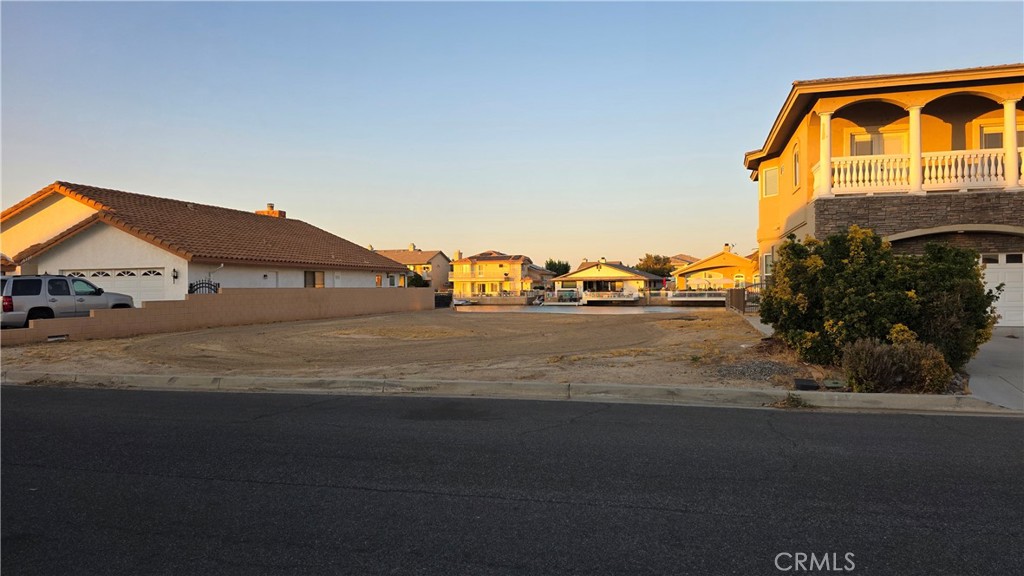 One of the last of its kind! This unique piece of land sits right on the water in the extremely desirable and highly sought after community of Spring Valley Lake. Just imagine pulling up into your backyard where you can have your own boat dock for all your watercraft hobbies. Located in the heart of Victorville this parcel of land offers a unique opportunity for both investors and dreamers looking to build their perfect retreat. Victorville is a rapidly growing city in the High Desert. With its scenic desert views, rich history, and ever-expanding infrastructure, this area is becoming a hotspot for new development and investment. Be immersed in what Spring Valley Lake has to offer. The lake itself is private and offers 200 acres for boating, kayaking, fishing, and swimming. There are loads of outdoor and recreational activities to enjoy. Including hiking, biking, walking trails, tennis courts, basketball courts, parks, playgrounds and of course golfing. Be sure to call for more information on this amazing opportunity.