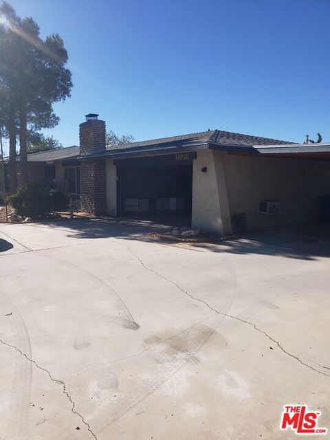 Photo of 14198 Kiowa Road, Apple Valley, CA 92307 (MLS # 26814867)