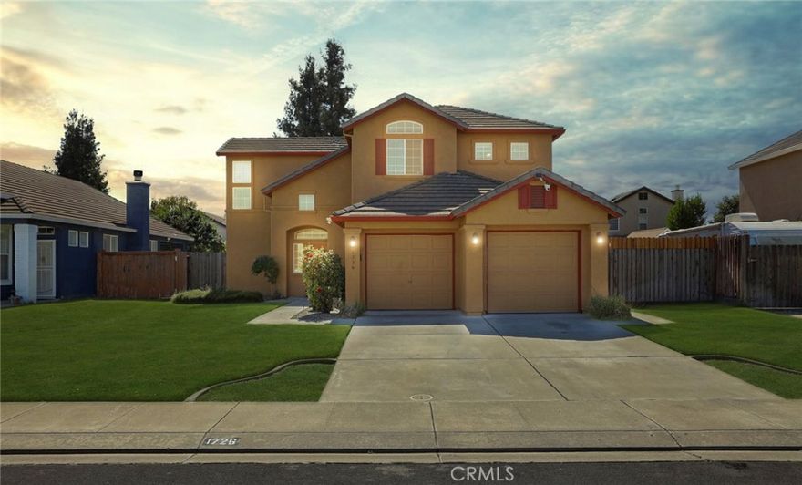 Welcome to this inviting 4-5 bedroom, 2.5 bath home offering 2,301 sq ft of comfortable living space. Built in 1999 and set on a spacious yard, this Manteca gem is perfect for both relaxing and entertaining. The open kitchen features a large island with a sink, ideal for meal prep or casual gatherings. The family room is anchored by a cozy fireplace, and a versatile room can easily serve as a home office, playroom, or media space. Retreat to the primary suite, where you'll find a freshly updated shower stall for a modern touch. A durable tile roof and leased solar system help keep energy costs low while adding long-term value. Situated near schools, parks, and local amenities, this home combines everyday convenience with plenty of room to grow. Don't miss the chance to make it yours!
