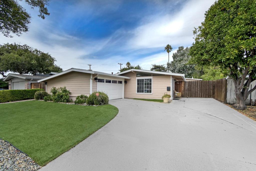 Desirable Lakewood Neighborhood of Sunnyvale, step into style, comfort, and innovation with this fully remodeled 3-bedroom, 2-bathroom mid-century modern home designed for modern living, this home blends architectural charm and high-end finishes. Wide-plank engineered floors throughout, a thoughtfully reimagined open layout with skylight, and a beautifully updated kitchen featuring granite countertops, stainless steel appliances including built-in wine fridge, ideal for entertaining, both bathrooms have been elegantly renovated. Flexibility of living room plus a spacious family room, offering multiple zones for work-from-home setups, relaxation, or hosting guests. Large side yard includes custom pavers for RV or toy parking, a detached workshop 14 x 14 is ready to become your office, personal makerspace, or creative studio. The backyard is equally inviting with natural lawn, a paved patio and built-in gas line for effortless BBQs or cozy fire pit evenings. Just minutes from major tech campuses like Google, Apple, LinkedIn, and Meta, this home puts you close to the heart of Silicon Valley innovation. Quick access to freeways, parks, dining, and shopping completes the lifestyle and a rare blend of timeless design.