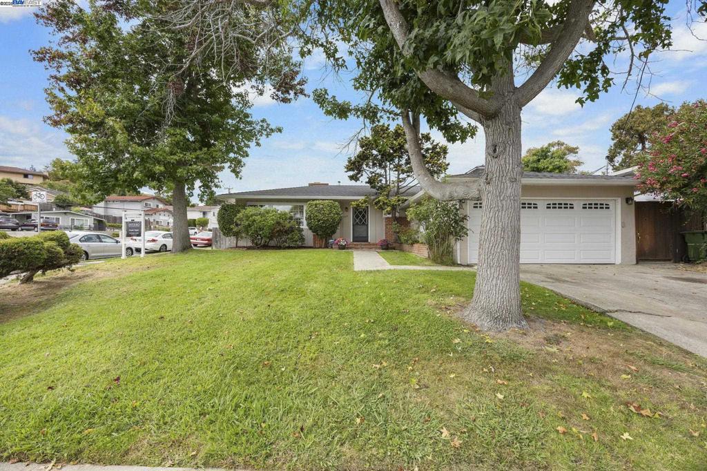 Charming Castro Valley Ranch on a Spacious Corner Lot! Welcome to 3304 Brookdale Blvd, a beautifully maintained 3-bedroom, 2-bath ranch-style home with 1,224 sq ft of living space on a 6,120 sq ft lot. Built in 1952, this home combines timeless appeal with thoughtful updates. Inside, you’ll find a bright living room anchored by a brick fireplace with gas insert, hardwood floors, and large windows that fill the space with natural light. The updated kitchen boasts granite countertops, modern cabinetry, and a dishwasher, offering both style and function. The floor plan includes three comfortable bedrooms and two full bathrooms designed with today’s lifestyle in mind. An inside laundry with washer and dryer adds everyday convenience. Step outside to enjoy a private backyard oasis complete with a covered patio, fenced yard, automatic sprinklers, mature landscaping, and storage. An attached two-car garage plus RV/boat parking provide flexibility for vehicles and hobbies. Additional highlights include: Forced-air heating, double-strapped gas water heater Stucco exterior Composition shingle roof Corner lot with curb appeal and outdoor entertaining potential Located just moments from Lake Chabot, schools, shopping, dining, and BART,with quick access to I-580 and I-880