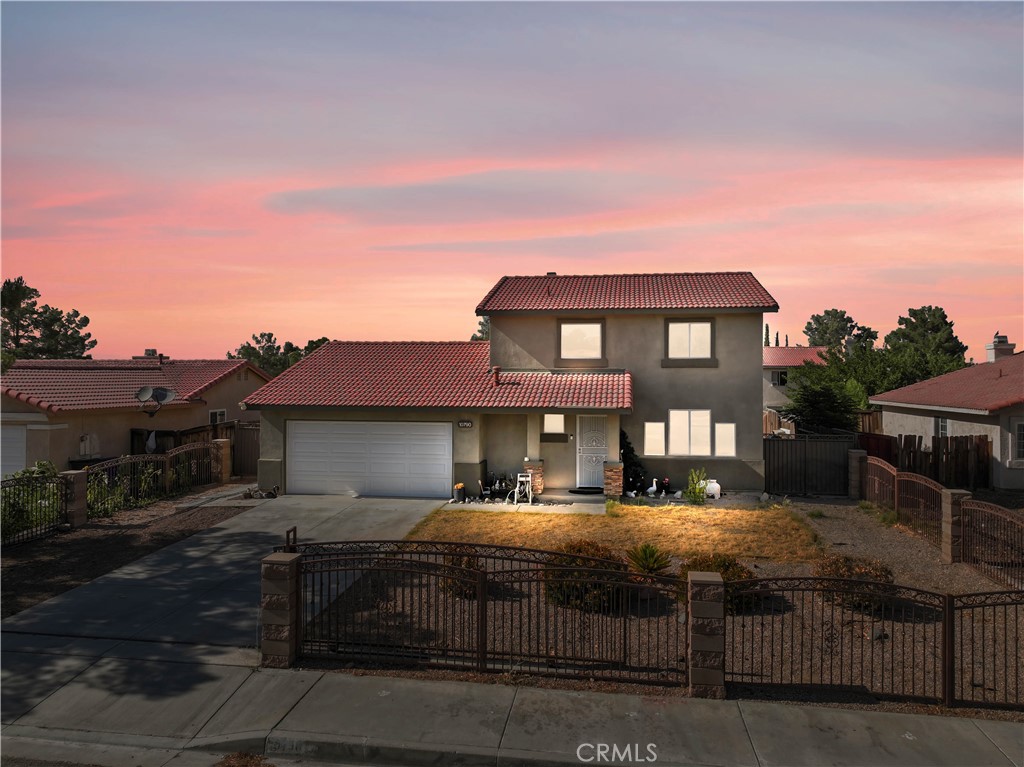 Welcome to this beautiful two-story home in the city of Adelanto, offering the perfect blend of space and comfort for your growing family. This home features 4 bedrooms, plus a bonus 5th bedroom created from the garage conversion by the previous owners. With a generous 7,194 square foot lot, you'll have plenty of room to enjoy both indoors and out. As you enter, you'll be greeted by a spacious living area that flows seamlessly into a well-sized kitchen and dining area, ideal for family gatherings and entertaining. The expansive backyard is perfect for hosting outdoor events or simply relaxing in your own private space. Conveniently located near shopping centers, this home provides easy access to everything you need. Don't miss the opportunity to make this wonderful home your own!