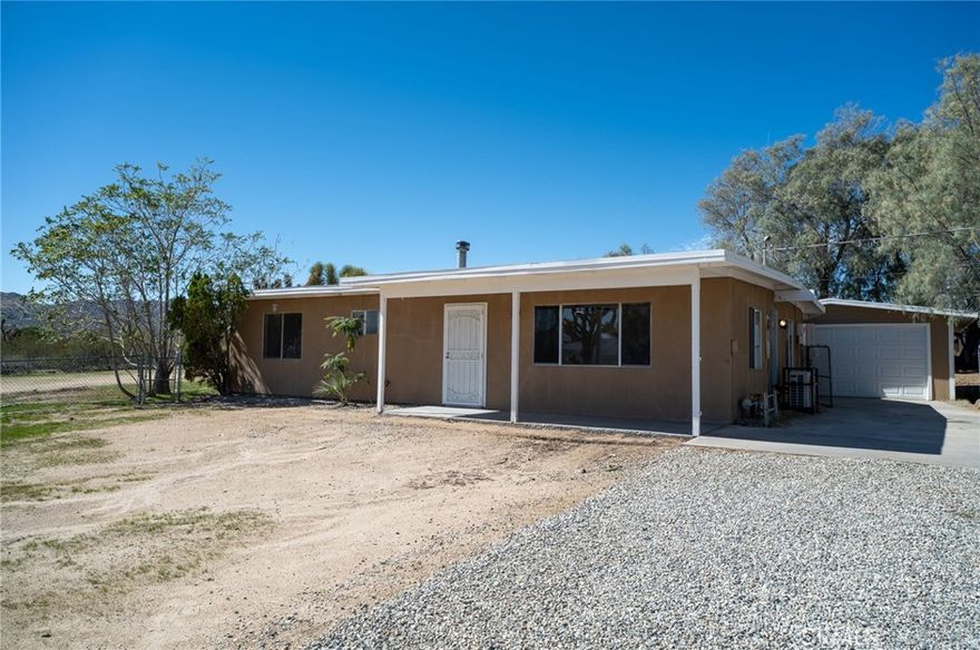 Just Updated – City-Referenced ADU Information Included | Dual-Parcel Property Near Joshua Tree ??



Two Legal Parcels | Modernized Home with Recent Improvements | City-Referenced ADU Potential



A rare dual-parcel property in Yucca Valley allowing the opportunity to reside in one home and plan development on the adjoining parcel. I have spoken with Jerome Girard, Planning Official for the City of Yucca Valley, regarding accessory-dwelling-unit and new-construction guidelines. Per the City Planning Department and the official ADU reference guide supplied by Mr. Girard (uploaded in MLS supplements), the adjoining parcel may allow an additional single-family residence plus up to two detached ADUs (buyer to verify directly with the City).



The existing 3-bedroom, 2-bath home includes granite countertops, updated bath fixtures and lighting, new vanity mirrors, sinks, toilets, and ceiling fans in each room. The kitchen and hallway feature new recessed lighting, creating a bright, welcoming atmosphere.



The City’s ADU guide and supporting documentation are provided in the MLS supplements for buyer review. Approximately seven miles from Joshua Tree and close to downtown Yucca Valley, this property allows potential for future expansion, ADU development, or comfortable desert living.



? Buyer to perform independent due diligence with the City of Yucca Valley and all related agencies concerning zoning, building, ADU, and short-term-rental regulations.