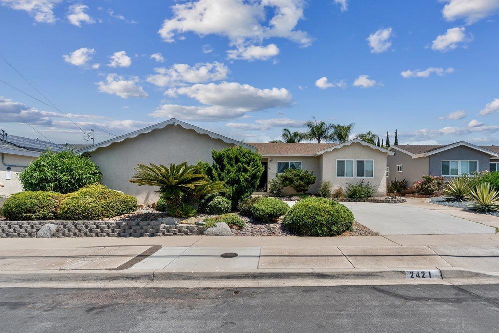 Welcome to 2421 Casement St! This beautifully upgraded 4-bedroom, 2-bath residence offers 1,725 sq. ft. of comfortable living on a generous 6,200 sq. ft. lot in a quiet, centrally located neighborhood. The kitchen features quartz countertops, newer appliances, and a large island that doubles as a gathering space. A bright living room and airy family room provide warmth and versatility—perfect for everyday living or entertaining. Step outside to a spacious backyard with a custom shed wired with electricity—ideal for a creative studio, home office, gym, or retreat. Recent updates include fresh interior paint, new flooring, modern lighting, ceiling fans, a new water heater, plus a brand-new washer, dryer, and dishwasher. Designed with accessibility in mind, this home offers comfort for all. Conveniently located just minutes from Snapdragon Stadium, parks, shopping, schools, and major freeways, this meticulously maintained property blends charm, function, and location—ready to become your forever home.