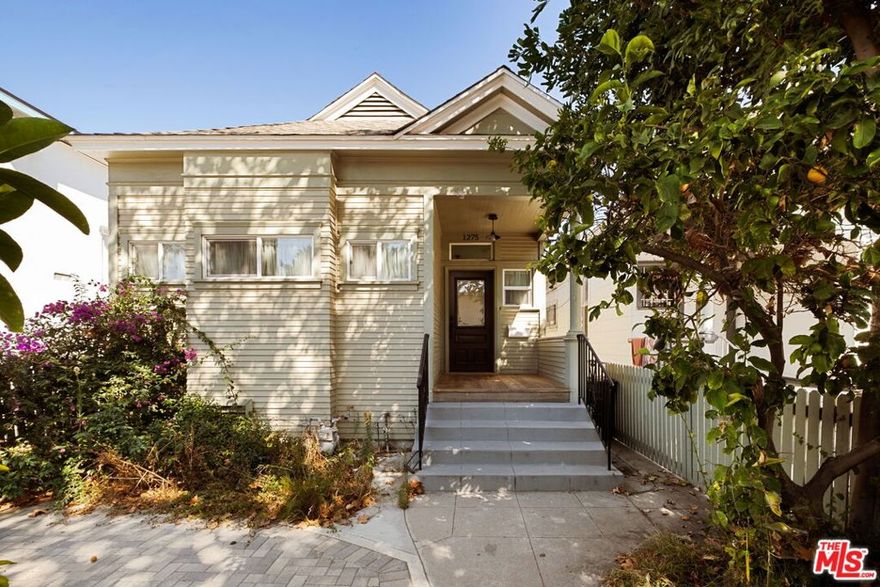 Step into this storybook Craftsman filled with light, character, and comfort. Behind its classic facade lies a fully renovated 4-bedroom, 3-bath home blending original charm with modern convenience. The open layout features lofted ceilings, excess windows, and freshly refinished oak floors that create a warm, airy atmosphere throughout. The kitchen and baths have been thoughtfully updated with contemporary finishes. A large, private backyard offers ample space for outdoor entertaining, or relaxation. While the property does not include on-site parking, the street provides easy, available parking right out front. Ideally situated in a historic neighborhood, this home captures the best of old-world charm and modern living.