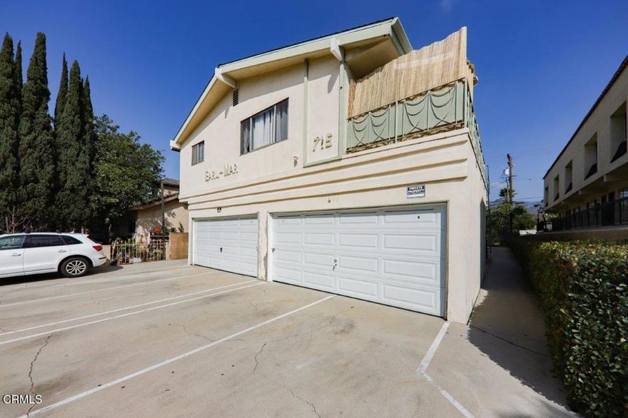 This top floor unit has an ideal setup in a great, central area.  This is a very clean,  remodeled, large, two bedroom home with an open floor plan and lots and lots of space.  The kitchen is brand new...new cabinets, counters, appliances, sink and fixtures.  The kitchen is bold, bright and stunning.  The living room is huge.  The bedrooms are also large.  Bathroom is also completely remodeled.  The unit is private with only two common walls.  There is a laundry facility in the building.  This home comes with one garage space for covered parking AND one outside parking space in the driveway (two assigned parking spaces).