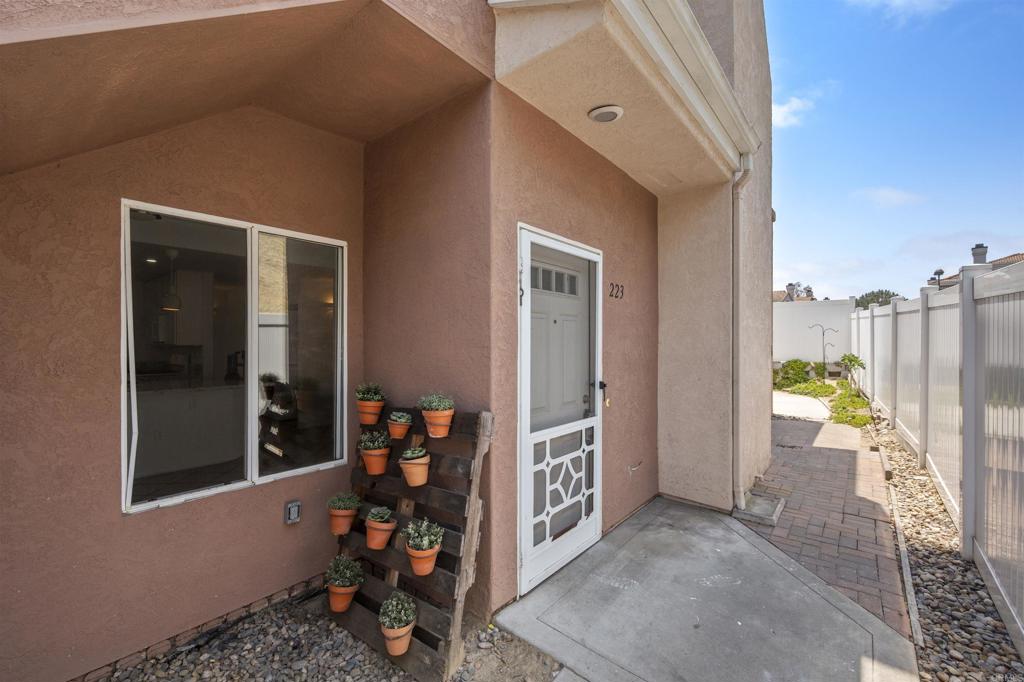 Act fast—this is your chance to own a rare single-level condo with an attached garage, large yard, priced below market for a quick sale! With a little sweat equity, this gem can shine. Enjoy a remodeled kitchen, hard surface flooring, and an upgraded primary bathroom with a spacious walk-in shower—offering the perfect foundation for comfortable living. The attached garage is a true bonus, enhanced with laminate flooring and ceiling fans—ideal as a gym, workshop, or creative flex space. Plus, you'll love the convenience of an interior laundry closet and one assigned parking space. All of this in the desirable Sanibelle community with a pool, spa, and playground—low HOA fees and no Mello Roos. Perfectly located in the Terra Nova neighborhood, just minutes from the 805 freeway, Terra Nova Shopping Center, Terra Nova Park, and Clearview Elementary. Opportunities like this are rare—don’t wait!
