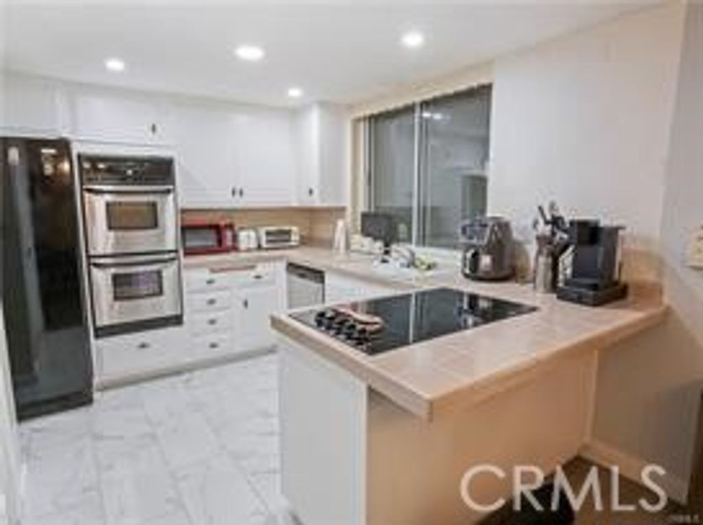 Photo of 3500 W Manchester Blvd #450, Inglewood, CA 90305 (MLS # PW26004787)