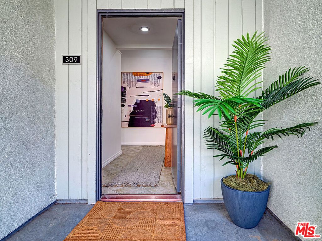 Photo of 1887 Greenfield Avenue #309, Los Angeles, CA 90025 (MLS # 25600419)