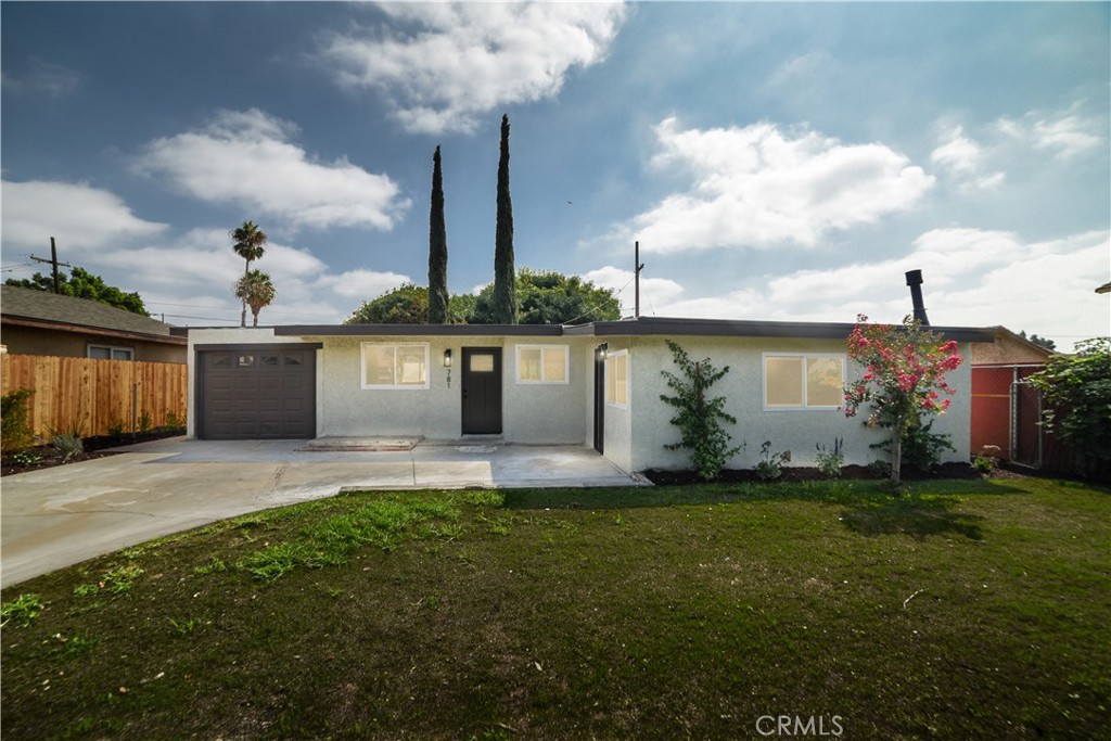This single-story charmer has been freshly updated with new interior paint, brand-new flooring, and bright recessed lighting that gives the whole home a warm, modern feel. Both bathrooms have been tastefully redone, making them fresh and inviting. Step outside and enjoy the backyard, complete with a covered pergola that’s perfect for relaxing or entertaining. Plus, there’s a detached single-car garage—great for extra storage, a workshop, or even a home office. With all the upgrades done, this home is ready for you to move right in and start enjoying!