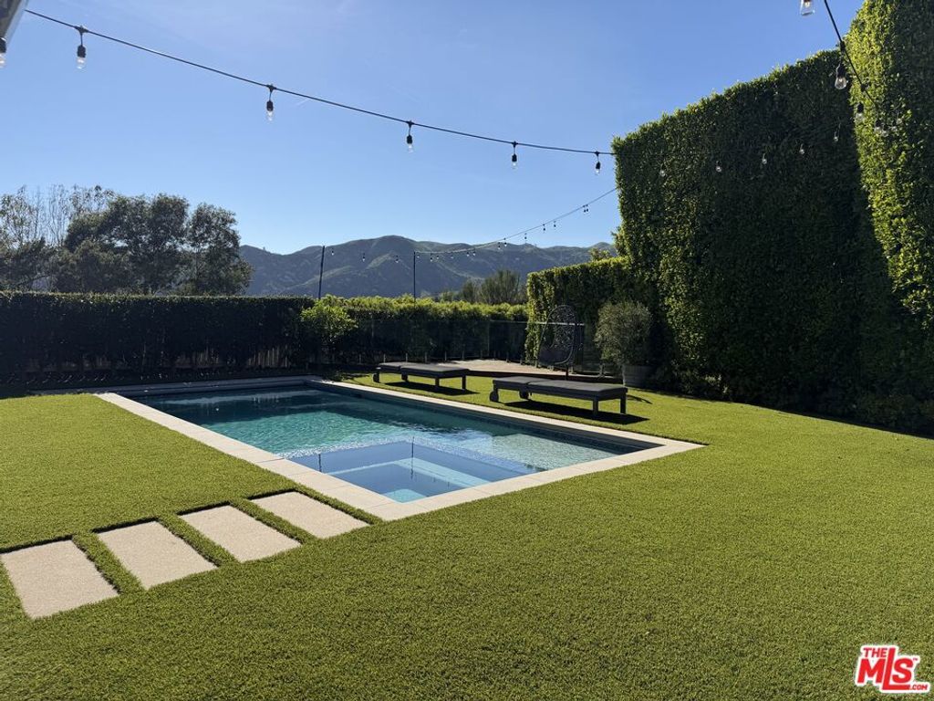 Photo of 13710 Bayliss Road, Los Angeles, CA 90049 (MLS # 26702355)