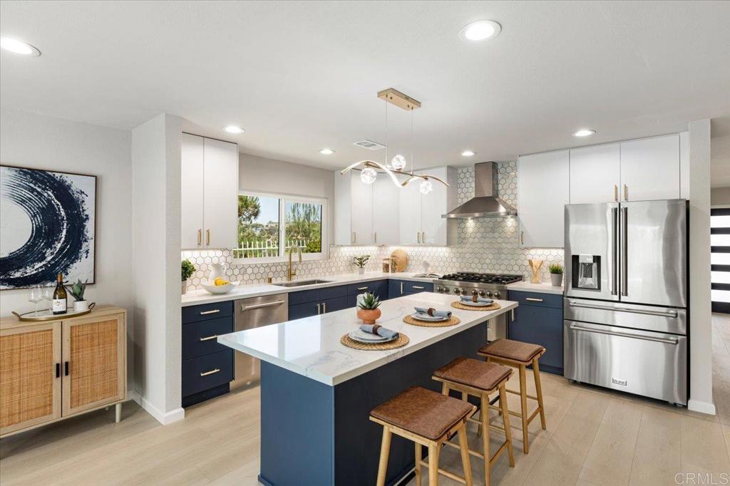 Welcome to your dream home in the heart of South La Costa, where modern luxury meets unbeatable location. This beautifully remodeled 4-bedroom, 2-bathroom home has been meticulously updated from top to bottom, offering a truly turnkey living experience in one of the area's most sought-after neighborhoods. Situated within walking distance to top-rated schools in the San Dieguito Union High School District—recognized as one of the best districts in the region—this home is perfect for families seeking both style and educational excellence. Step inside to discover a bright and open floor plan featuring designer finishes, wide-plank flooring, and premium materials throughout. The heart of the home is a chef’s dream: a fully renovated kitchen equipped with commercial-style stainless steel appliances, custom cabinetry, and sleek quartz countertops—ideal for both entertaining and everyday living. The spacious primary suite offers a serene retreat, while three additional bedrooms provide flexibility for family, guests, or a home office. Both bathrooms have been tastefully updated with high-end fixtures, tilework, and modern vanities. Other features include updated systems, energy-efficient windows, and a private backyard ready for your personal touch—perfect for relaxing or hosting gatherings. Don’t miss this rare opportunity to own a fully upgraded home in one of North County San Diego’s most desirable locations—just minutes from top schools, beaches, shopping, and dining. Schedule your private tour today and experience the best of South La Costa living!