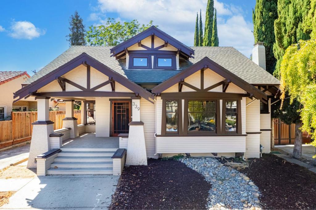 Welcome to this beautiful two-story customized Craftsman home with 5 bedrooms and 4 bathrooms in the premiere Naglee Park neighborhood of San Jose. House is filled with natural light. The specious sunlight-bathed bedrooms are a perfect alternative for home office. Downstairs features a newly refinished hardwood floor, panelings and coffered ceiling. The large U-shaped gourmet kitchen offers quartz countertops, matching backsplash, ample cabinetry, and stainless-steel appliances. Primary bedroom suite has a walk-in closet and an en-suite bathroom upgraded with quality fixtures. Upstairs is a spacious family room with vaulted ceilings, skylights, large windows and luxury wide plank laminate flooring. The second en-suite features a large bedroom, closet, and modern bathroom, plus another bedroom and bathroom on the same level. Additional features include recessed lighting, abundant storage with a basement, a utility room with washer and dryer, and a detached two-car garage. Conveniently located near restaurants, shopping, grocery stores, and San Jose State University, with easy access to Highways 101, 280, and 87 for a quick tech commute. Make this your home and explore the infinite possibilities!