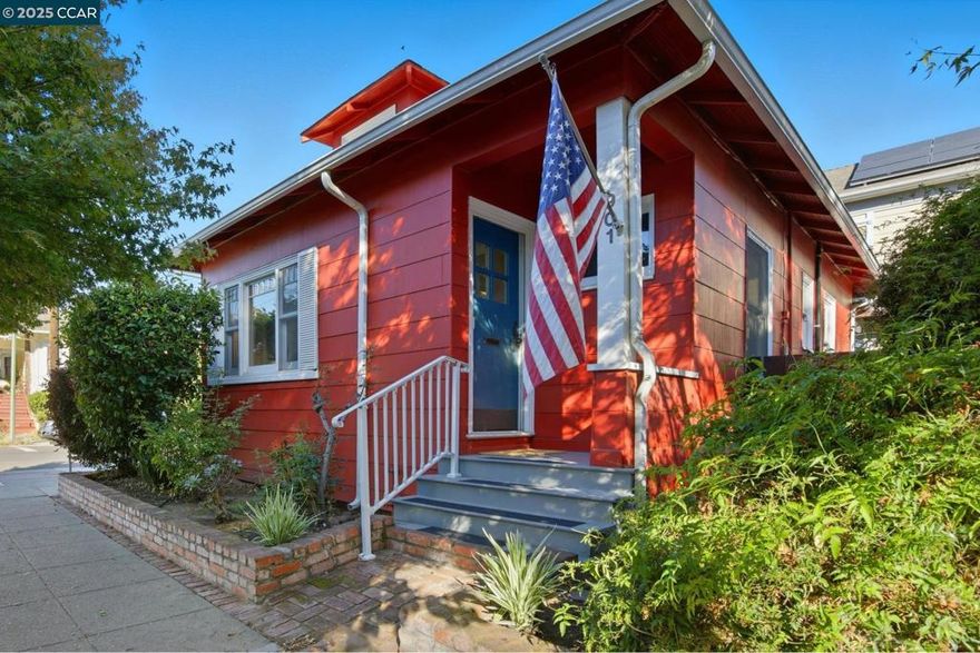 Welcome to 901 San Antonio in Alameda’s coveted Gold Coast! This 1905 Craftsman cottage packs character into every inch. 2 bedrooms and 1 jack-and-jill bathroom on a sunny corner lot. Fresh interior paint sets off Craftsman details throughout: warm hardwood floors, beadboard in the bedroom, classic picture-rail molding, and a living room anchored by an original brick fireplace beside a period built-in cabinet. The updated kitchen honors the home’s period style with abundant wood cabinetry and a gas range hookup for your inner chef. Practical spaces abound—an unfinished basement with laundry and storage plus a floored attic offering exceptional additional storage. Set in Alameda’s laid-back, walkable island community, you’ll love the tree-lined streets, plentiful shops and highly rated schools. This is a rare opportunity in the Gold Coast: vintage charm, thoughtful updates over time and move-in readiness make this jewel box the perfect Alameda gem. Come see it before it's gone!