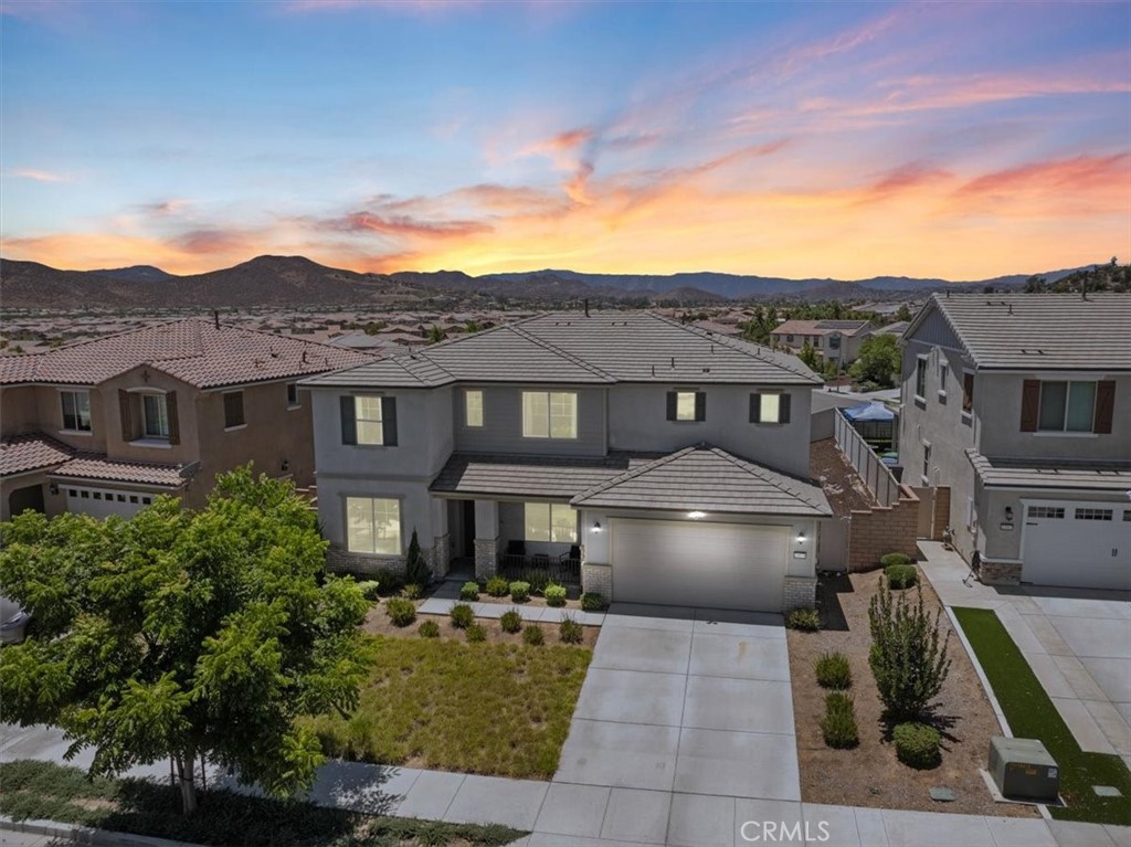 **Come experience the vibrant lifestyle offered in the master-planned community of Audie Murphy Ranch.** This exceptional community features resort-style amenities, including an 11-acre sports park with playgrounds, sports fields, a basketball court, and a skate park. The Ranch House serves as a central gathering hub with resort-style pools, a clubhouse, kids’ play areas, and frequent HOA-hosted events that bring neighbors together. Miles of scenic trails wind through the community, perfect for walking, biking, or exploring the outdoors.This home is equipped with premium features for comfort and convenience, including a whole-home surround sound system for immersive audio throughout, a water softening system that helps protect plumbing and appliances, and a reverse osmosis (RO) water filtration system providing clean
This spacious two-story home blends modern design with comfort. The first level offers a welcoming entry, a living room, and an open-concept kitchen and dining area that flows into a large great room. Just off the kitchen is a walk-in pantry, a dedicated office space, and access to a four-car garage. A first-floor bedroom with an adjacent full bathroom makes an ideal space for guests or extended family.
Upstairs, the home continues to impress with a versatile loft/game room ideal for studying or entertainment. The primary suite features a luxurious en suite bathroom with dual vanities, a separate tub and shower, and a walk-in closet. Three additional bedrooms each have access to a bathroom, and the upstairs laundry room adds convenience to everyday living.
Additional highlights include drought-resistant landscaping, an electric solar system for energy efficiency, and a spacious backyard with a covered patio—perfect for outdoor entertaining. This is more than just a home; it’s a lifestyle. **Don’t miss your chance to live in one of the most sought-after communities in the area!**