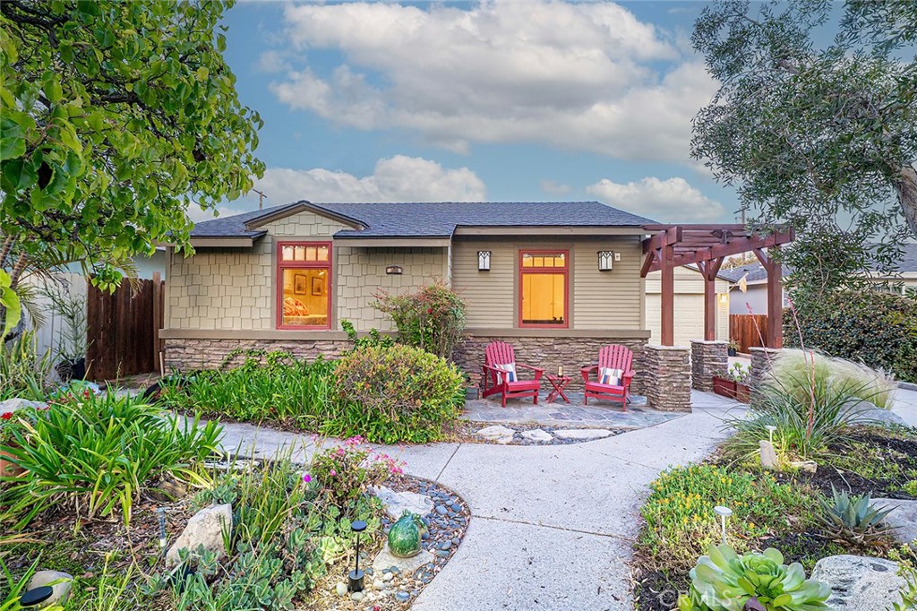 Custom home in Alamitos Heights, Long Beach CA. — This single story beautiful Craftsman design is completely powered by owned solar system. Ocean breezes and conveniently located just a short distance to Marina Vista park, Colorado lagoon, golf courses, and 2nd St. Belmont Shore, and Main St Seal Beach for shopping and dining. Offering the perfect blend of elegance and comfort. Spanning 2,210 square feet, this thoughtfully designed bright and airy abode features an open concept and thoughtfully designed with 3 spacious bedrooms and 2 luxurious bathrooms, in addition to an office or workshop.
Step inside to discover the beauty of hardwood floors that flow throughout. The heart of the home, a chef’s kitchen with a center island, a culinary enthusiast’s delight. It boasts high-end stainless steel appliances, a gas stove, an island, granite countertops, providing the ideal setting for gourmet cooking. The open kitchen design connects effortlessly to the formal dining room, perfect for hosting intimate dinners or lively gatherings. Relax by the cozy fireplace on cooler nights or enjoy the peaceful sound of the water feature in the 2nd living room with it's own patio area. Enjoy the convenience of a dedicated laundry room. The home's efficient air conditioning and central heating ensure comfort year-round. Outside, another private patio offers a serene escape for morning coffees or evening relaxation.
Additional features include completely paid for solar panels, copper plumbing, 2 separate water heaters, newer roof, an attached 2+ car garage with a pull down staircase to the attic for lots extra storage. This exquisite home represents a rare opportunity to enjoy luxury living in a prime Long Beach location. Don't miss the opportunity to call this stunning house your home. Schedule a viewing today!