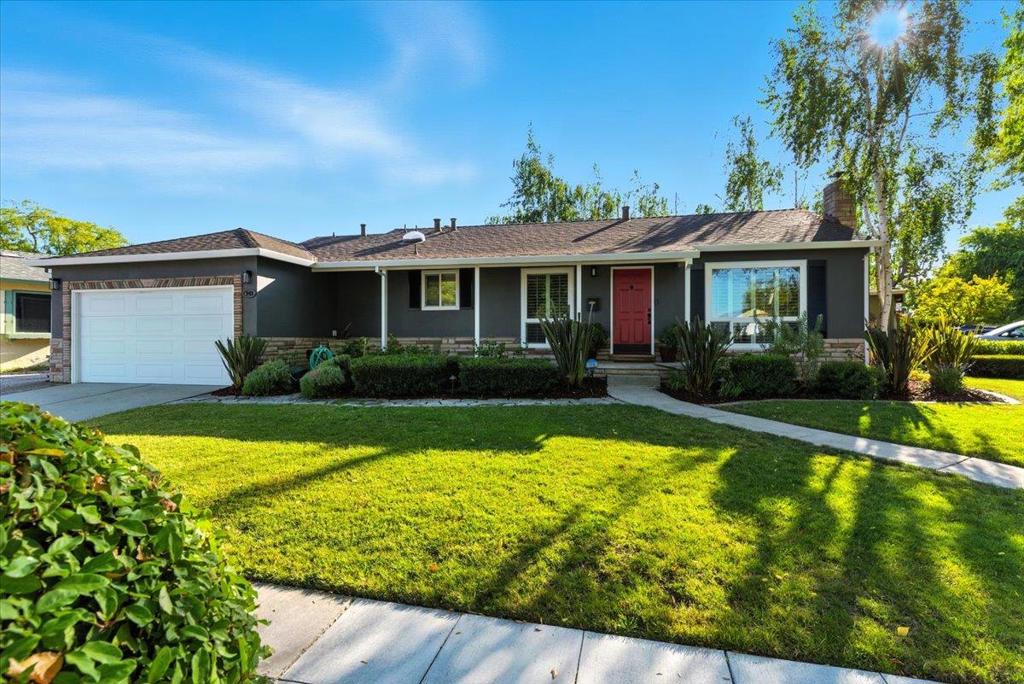 Charming character meets modern comfort in this beautifully updated Northeast facing corner lot home, just two blocks from Valley Fair Mall and Santana Row. Hardwood floors, a cozy fireplace, and an open layout create a warm, inviting feel. The chef's kitchen features sleek granite countertops and stainless steel appliances, while the updated bathroom adds fresh style. Light-filled bedrooms overlook a refreshed backyard with beautiful plants, citrus trees and a patio - perfect for outdoor relaxation. Upgrades include a brand new roof, recessed lights, new interior and exterior paint and refreshed landscaping. With an attached two-car garage, easy freeway access, and room to expand, this home offers both style and potential in the heart of Silicon Valley. Easy access to all freeways.