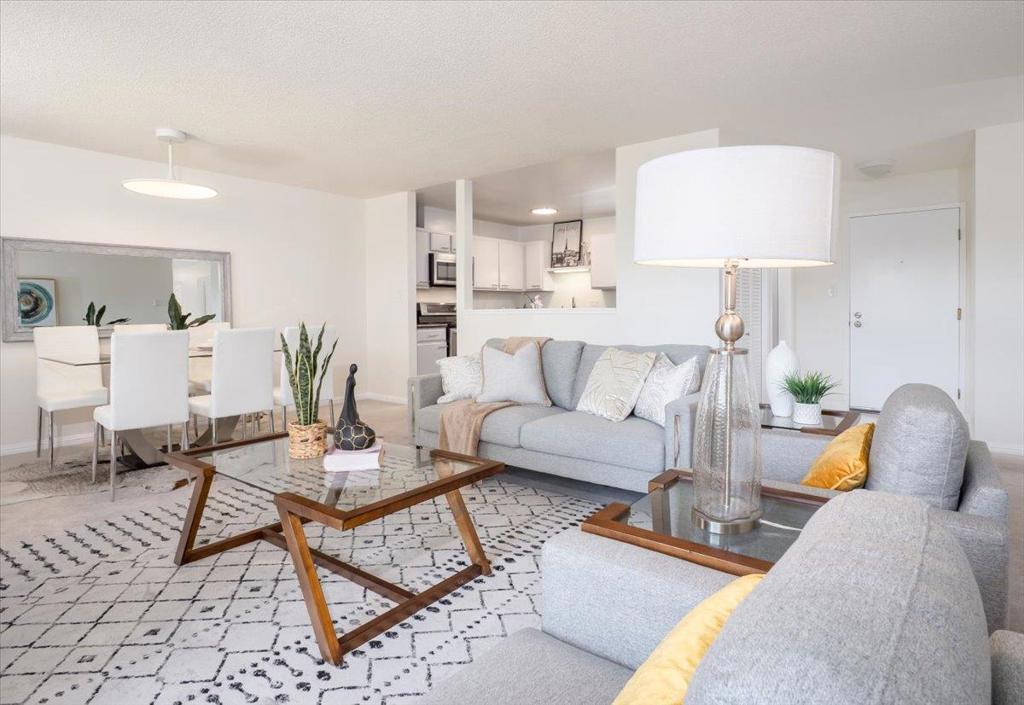 Spacious 2BR/2BA 1286 sq ft condo in the desirable Marina Point community. The unit features brand-new paint throughout, an open-concept living/dining area with a fireplace, and a private balcony surrounded by trees. Inviting kitchen with granit countertops and stainless steel appliances. In-unit laundry, additional storage in the hallway. All appliances included. Primary suite features dual closets and a flexible sitting area or home office space. One assigned garage parking and plenty of guest parking in the complex. Enjoy resort-style amenities: pool, spa, tennis courts, clubhouse, RV/boat storage, playgrounds, and lush greenbelts. HOA covers earthquake insurance, water, and gas. A perfect commute location near 101/92, Bay Trail and other waterfront trails, excellent Foster City schools, and shops. Buyer to verify all information.