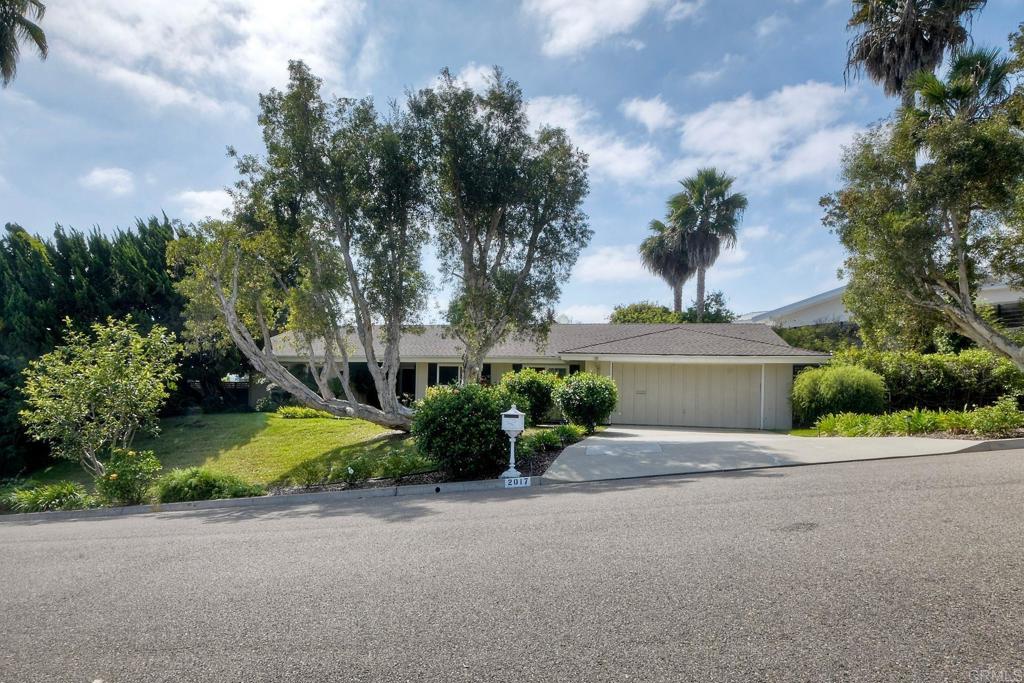 Welcome to La Costa Resort living — single story furnished perfection with golf course views — one of North County’s most coveted enclaves, tucked between the rolling fairways and the coastal breeze. Every street here ends in a quiet cul-de-sac. Neighbors wave as they pass by on golf carts heading to the resort for dinner, drinks, or a quick round of golf and tennis. It’s that kind of place where life slows down and every day feels like vacation. This highly sought-after single-story home sits on a generous, tree-lined lot with a spacious backyard perfect for lounging or entertaining. Step inside and you’ll find an open, airy floor plan with three bedrooms and two baths, designed for easy living and effortless flow. This home offers the ideal blend of comfort and resort-style living. Just minutes from world-class golf, tennis, and the legendary Omni La Costa Resort & Spa — and only a short drive to the beach, fine dining, and shopping. Come experience La Costa living at its finest — where every day feels like a getaway and your backyard is a resort.