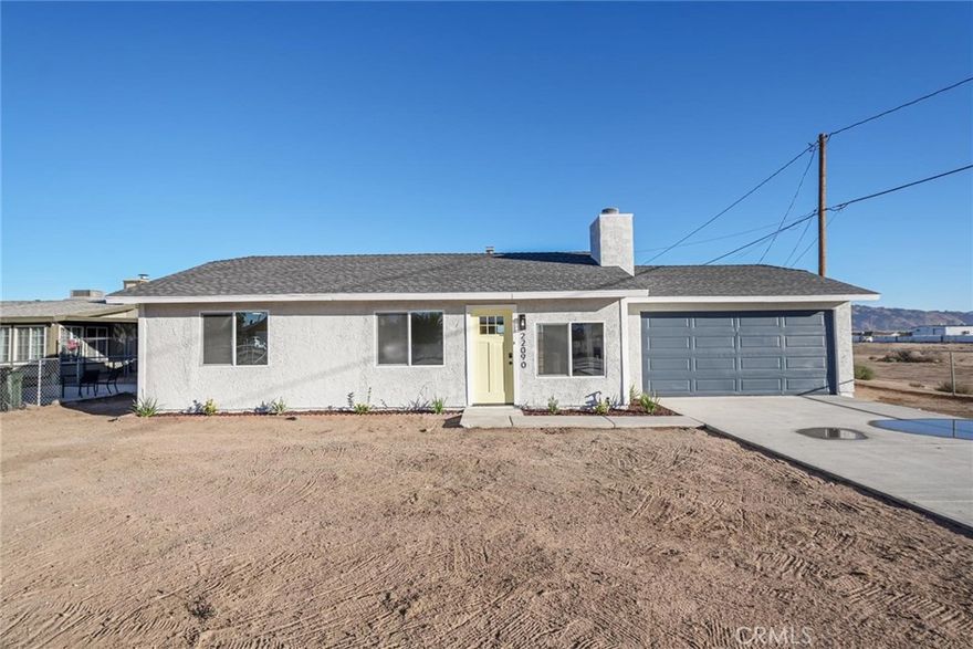 This beautifully remodeled 3-bedroom, 2-bath Apple Valley home blends modern comfort with timeless desert charm. Thoughtfully updated from top to bottom, it features a new roof, dual-pane windows, fresh paint inside and out, and new flooring throughout. The open living area is bright and inviting with recessed lighting and an updated fireplace surround, while the kitchen offers painted cabinetry, new countertops, modern hardware, and a full suite of new appliances. Both bathrooms have been stylishly refreshed with new fixtures, vanities, and reglazed enclosures. Additional updates include new doors, trim, outlets, switches, and a new water heater. The property sits on a fully fenced lot front and back with plenty of space for RV parking, plus a large storage shed and a versatile shipping container workshop offering added storage and utility. This move-in ready home is connected to public sewer and offers the perfect balance of comfort, functionality, and long-term value. Take advantage of the 1/0 lender buydown to enjoy a lower interest rate and thousands in savings during your first year.