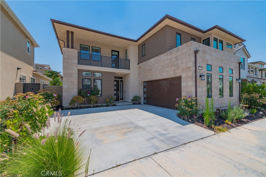 Welcome to 72 Crater, a stunning residence located in the highly desirable community of Portola Springs, Irvine. This light-filled home offers 3 bedrooms and 3.5 bathrooms and loft with an open-concept floor plan designed for modern living.The gourmet kitchen features premium stainless steel appliances, quartz countertops, and a spacious island — perfect for cooking and entertaining. The inviting living and dining areas open to a private outdoor patio, ideal for relaxing or hosting guests.Upstairs, the luxurious primary suite boasts a large walk-in closet and a spa-inspired bathroom with dual vanities, a soaking tub, and a separate shower. Additional 2 bedrooms are generously sized with ample storage.The expansive loft/office opens to a private balcony, creating an inspiring space for work or relaxation. A large laundry room with sink and additional storage, plus a secondary en-suite bedroom with walk-in closet, complete the upper level. Step outside to a generously sized backyard—professionally landscaped, filled with mature fruit trees, and offering ample potential for future enhancements like a pool, garden, or outdoor kitchen. Freshly painted and recently updated, this turnkey home is within walking distance to the award-winning Portola High School and just minutes to top-tier shopping, dining at Woodbury Town Center, and a short drive to all Irvine Great Park amenities.