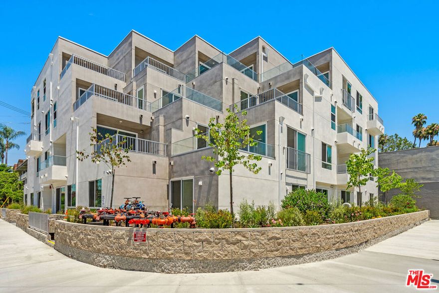 Welcome to The Fulton, a stylish, modern building located in the heart of Sherman Oaks just one block from vibrant Ventura Blvd, home to some of the city's best restaurants, cafes, and grocery stores. Where elegance meets practicality, this newer-construction building offers the perfect balance of architectural design, convenience, and comfort. This Top Floor unit features a contemporary kitchen with stainless steel appliances, in-unit washer and dryer, wood flooring, and an open-concept living and dining area. Additional features include one assigned parking spot equipped with an EV charger, adding convenience for electric vehicle owners.With thoughtful design elements and a prime location, this unit has everything you need to enjoy modern living in one of the Valley's most sought-after neighborhoods.