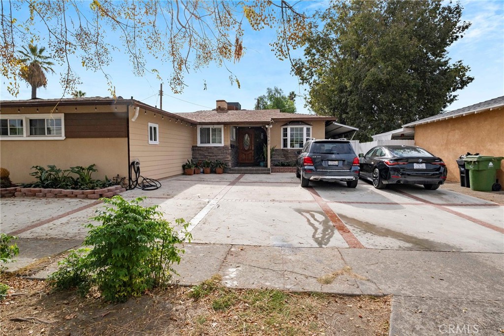 NORTH HOLLYWOOD HOME ALONG WITH ADU - This is an exceptional home that is well kept inside and outside, spacious interior with 3 bedrooms, fireplace and beautiful kitchen. A PLUS IS THE ADU that is behind the home, with its own address and utitlities. The newly built ADU has little over 500 square feet, with one bedroom, all new kitchen, family area and laundry room..Ample parking space for both homes. Come and take a look at this property, great property for a large family or if you just want a family member, friend or just to rent it out. No garage but ample parking that will accomodate both homes.
