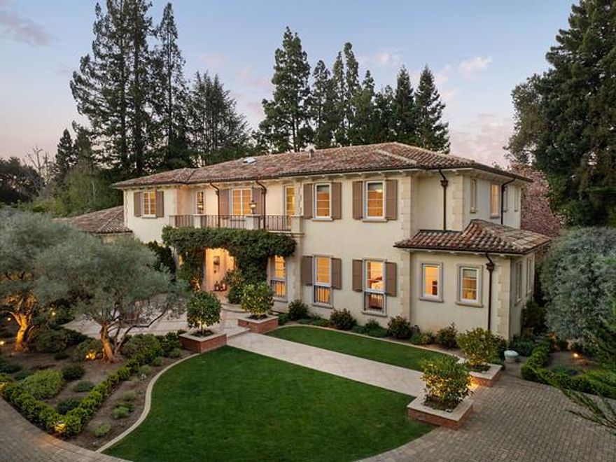 In the prestigious Menlo Circus Club area, this architectural masterpiece stands as a beacon of luxury, embodying the essence of a modern Italian villa. Every aspect of the property has been meticulously curated w/unparalleled materials from across the globe, including bespoke wall coverings & lighting specifically made for this estate. The home radiates an exceptional level of craftsmanship, featuring an array of exquisite marbles, onyx, and hand-selected mosaics & tiles, all harmoniously paired w/timeless travertines & terra cottas. Designed to accommodate both lavish events & private moments, the main residence extends its luxury to a pool-side cabana complete with a fitness center & spa bath, along with a recreation/media room & classic wine cellar. The stunning grounds feature a fireplace loggia, pool & elevated spa (each w/automated cover) w/mature, fruitless olive trees & fountain wall, fire pit terrace & bocce ball court, plus custom designed fruit, herb & flower kitchen garden w/strawberries, rosemary, bay, Kaffir lime, lemon verbena, mint espaliered fig, scented geranium, mature tangerine, lemon and Bearss lime trees.This home offers proximity to Stanford University, the venture capital hub of Sand Hill Road, Silicon Valleys tech centers & two international airports.