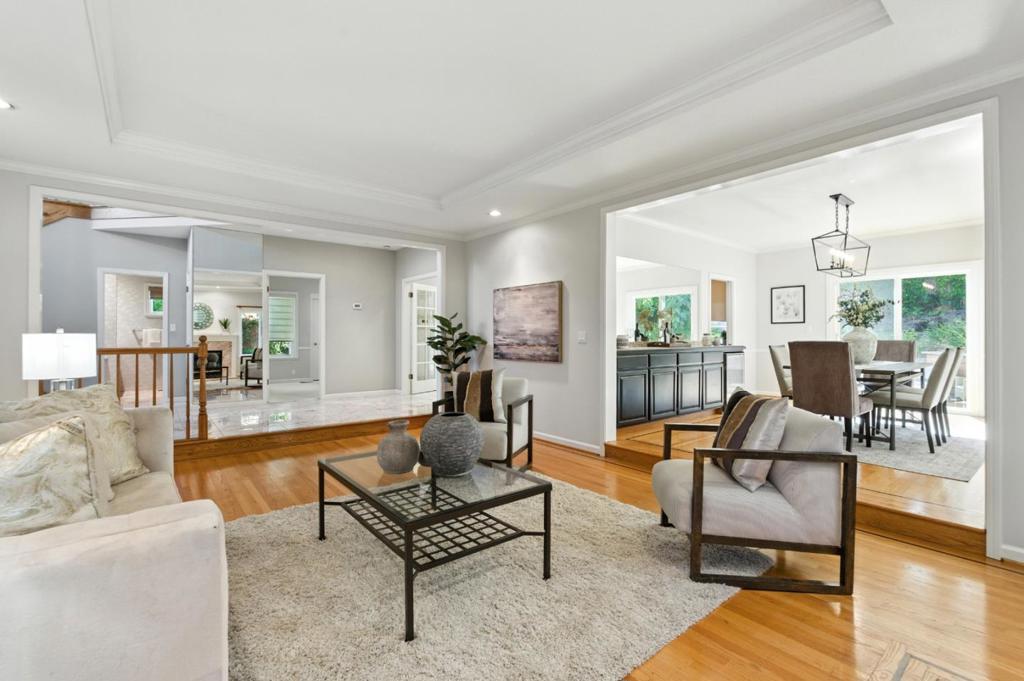 Welcome home to this wonderfully spacious 4BR/3BA home in an absolutely prime Emerald Hills location! As you walk through the front door, you're treated to a sweeping, open floor plan that includes all of the key rooms that are important to today's homeowners -- an elegant, formal living room, an expansive dining area, and an open family room that adjoins the gorgeous chef's kitchen. The layout of this home is perfect -- there's a guest bedroom on the ground floor that also can double as a home office. Upstairs, you'll find an incredible, expansive primary suite with its own gorgeously updated bathroom. The remaining upstairs bedrooms are generously sized, and there's even a bonus room adjacent to the laundry room that has endless possibilities, even if it's just for extra storage. This home also features newer dual-pane windows throughout and the roof is only 10 years old. 3711 Hamilton Way is an ideal location in one of the best parts of Emerald HIlls. It's within the highly desirable Roy Cloud School boundary, and it's a quick connection to any of your commute routes. But what you'll enjoy most is the sublime, peaceful living experience that really is Emerald Hills. Don't miss your opportunity to own this warm and inviting home!