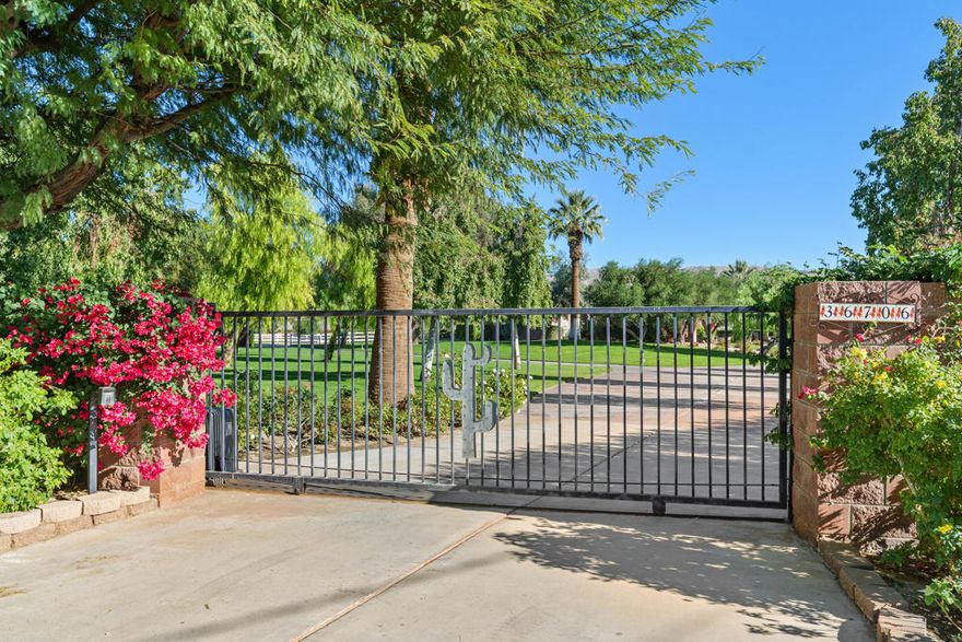 Welcome to your private, one-of-a-kind resort-style horse ranch on a breathtaking 4.6 acres!This exceptional estate offers the ultimate equestrian and outdoor lifestyle, complete with a barn , tack room , wash racks, a riding arena, and expansive turnout pastures. Plus it Backs directly to BLM land, allowing the property endless opportunities for horseback riding and hiking right from your own backyard.Pride of ownership is evident throughout. The grounds are impeccably maintained with lush green lawns, mature shade trees, and fully enclosed fencing that enhances privacy and tranquility. Multiple seating areas invite quiet moments to enjoy birds singing, stunning sunsets, and peaceful mornings.In addition to the main residence, the property features an approximately 1,400+ sq. ft. garage, offering rare and valuable space for 5-6 vehicles, boats, tall RV-style vehicles, or extensive storage. The third bay includes tandem parking, and workbench making it Ideal for hobbyists or collectors.The inviting 4-bedroom, 2-bath home is thoughtfully designed, including a versatile fourth bedroom with private exterior access--perfect for a casita, guest suite, office, or studio. The entertainer's kitchen is a standout, showcasing a large center island, stylish pendant lighting, elegant gray cabinetry, abundant storage, granite countertops, stainless steel appliances, and a striking tile backsplash. The kitchen opens seamlessly to the living room, creating a spacious great-room ambiance anchored by a beautiful stone fireplace.The oversized primary suite is a true retreat, filled with natural light from expansive windows and sliding doors that blur the line between indoor and outdoor living. The primary bathroom features dual sinks and an impressive custom walk-in shower accented with glass block and designer tile. A bonus room off the primary suite offers endless flexibility making it ideal for an art studio, private office, reading nook, or fitness space. Two additional guest bedrooms share a conveniently located bathroom.Outdoors, the back patio provides an additional gathering space overlooking a beautifully landscaped garden and tranquil views of the horses--perfect for entertaining or unwinding at the end of the day. A charming gazebo is already in place, ready to host special events or gatherings presents incredible potential for horse boarding, rentals, or small events.  Fully remodeled approximately 2015. A must see!