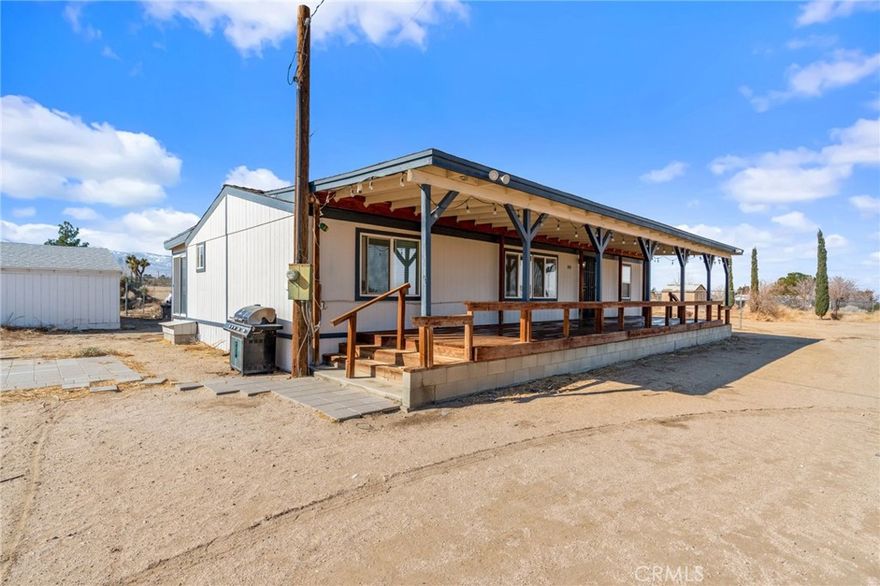 Discover the perfect blend of space, privacy, and desert charm with this incredible opportunity at 11524 Paramount Rd! Situated on a fully fenced 2-acre lot, this 3-bedroom, 2-bathroom manufactured home offers 1,152 sq. ft. of comfortable living space, all resting on a permanent foundation for added stability and peace of mind.



Step inside to a bright and inviting interior, where natural light fills the home. The layout features a versatile sunroom/extended living area, perfect for entertaining, relaxing, or creating your own unique space.



Outside, take in stunning desert views that stretch for miles, offering a peaceful and scenic backdrop. A greenhouse adds extra charm, giving you the chance to cultivate plants, flowers, or even your own little garden oasis.



With plenty of space to make it your own, this property is a rare find at an unbeatable price. Whether you’re looking for a serene retreat, room to expand, or a place to enjoy the beauty of the high desert, this home has it all.



?? Don't miss out—schedule your showing today!