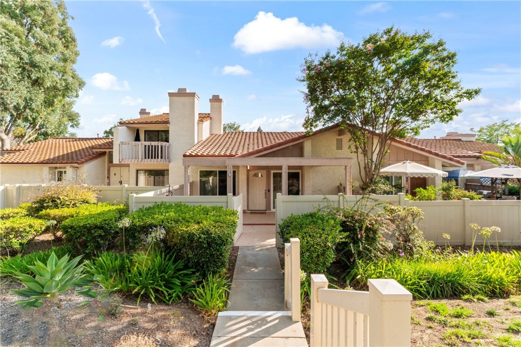 This highly desirable Woodlands townhome is a three bedroom, two bath single story with a two-car private garage. From the minute you step into the unit, you can feel the pride of ownership exuding through this unit all the way out to the garage. Vaulted ceilings in living room and dining room that opens to the private atrium. Completely updated with quartz and tile countertops, flooring & showers, stacked stone fireplace, flat ceilings, new paint, new fixtures, new appliances, new fans and has an abundance of cabinets in the garage with a quiet close garage door. Wall mounted TV mounts and hook-ups along with speakers round out the extras. Add in beautiful grounds in a fabulous community that offers a pool, spa, clubhouse and tennis court area along with schools, shopping, restuarants, a park, hiking trails and freeway nearby this unit provides all you need!