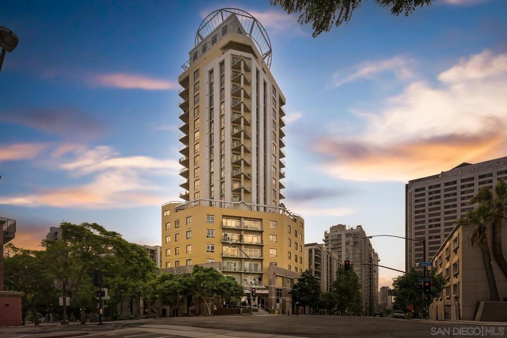 Discover a one-of-a-kind residence in the heart of Cortez Hill, where style meets convenience in one of Downtown San Diego’s most walkable neighborhoods. Surrounded by the city’s best dining, coffee shops, and entertainment, this isn’t your average upgraded condo—the seller curated every finish to celebrate modern urban living. Inside, you’ll find large-scale tile floors, a two-tone custom kitchen with designer backsplash, quartz countertops, and stainless steel appliances. The exposed concrete construction not only adds character but also ensures incredible privacy between neighbors—a rare find downtown. The bathrooms are true showpieces: each meticulously designed with custom tilework, while the primary suite features a fluted wood double vanity and a massive walk-in wet room with both a sunken tub and stand-up shower. Step out onto your private balcony and enjoy a peaceful retreat in one of the quieter downtown buildings. With just 67 units, you’ll appreciate the boutique feel, rarely wait for your elevator access, and a community that never feels overcrowded. This home blends bold design with everyday comfort in one of San Diego’s most vibrant locations. If you’ve been searching for something unique, private, and highly walkable—welcome home.