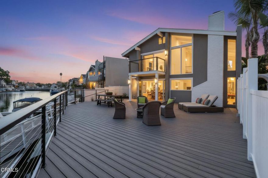 Welcome to your new completely renovated Mandalay Bay dockside retreat in the Channel Islands harbor. Located on a cul-de-sac with approximately 66 feet of channel frontage, this 3 Bedroom, 3 bath home has 1987 sf with a great open floor plan. Sellers have recently spent over $400,000 to totally update the home, including new windows and doors, a fabulous Kitchen with Dacor professional appliances, all new shaker white cabinets and quartz counters, new flooring and paint and a spectacular huge deck out back for entertaining, and even a side yard with lush landscaping. All 3 bedrooms are located upstairs and each have their own bathroom.  If you're looking for a turn-key, dock home in the Channel Islands harbor, this is it!  Bring your big boat!  Located A1/2 way between L.A. and Santa Barbara, come enjoy our beautiful coastal weather where you can boat to the islands, multiple yacht clubs, or minutes from the beach!  It doesn't get better than this.