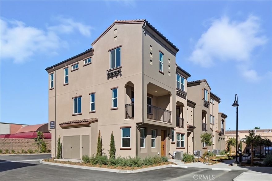 Welcome home to a brand-new collection of just 24 thoughtfully designed three story homes. This home is nestled toward the back of the community for added privacy, but perfectly located near freeways, shopping, dining, and entertainment — offering the ideal balance of convenience and an active lifestyle.



This home redefines modern living with dual primary suites, plus a versatile first-floor den, and an open-concept layout designed for connection and comfort. Imagine hosting in a spacious great room that opens to a private balcony, cooking in a sleek kitchen with quartz countertops, stainless steel appliances, dual sinks, and a pantry, or gathering in a dedicated dining area crafted for memorable moments.



Every detail is intentional: white shaker cabinetry, upgraded luxury vinyl plank flooring at select areas, expansive walk-in closets, an indoor laundry room with side-by-side hookups, and smart home technology — including a Ring doorbell, smart thermostat, and Brilliant smart switches — all included to elevate your lifestyle.



Discover the perfect blend of elegance, convenience, and modern living at Townes at Orange — where your dream home awaits.