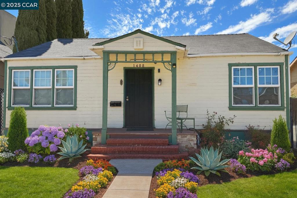 Bring your vision and transform this charming home with great bones- (Landscaped photos are digitally enhanced to help visualize the property’s possibilities). Original hardwood flooring in the living room and primary bedroom adds character, while updated windows offer a head start on improvements. Enjoy a spacious kitchen with a dedicated laundry room, plus a detached one-car garage for extra storage or workspace. Conveniently located just minutes from the freeway- ideal for commuters!