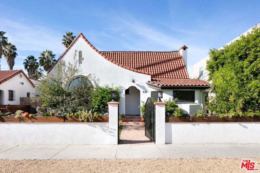 Beautiful 2 bedroom, 2 bathroom unit with a detached studio in a fully remodeled Spanish duplex. Highly coveted location in the heart of the Fairfax district. This unit has been meticulously renovated and offers high-end, modern upgrades including hardwood floors throughout, custom cabinetry, stainless steel appliances, central heat/AC, security system, and W/D in unit. The detached casita has a kitchenette, bathroom, heat/AC - perfect as a home office, exercise room or creative studio. Gated off-street parking. Walking distance to restaurants, shopping, and entertainment on Melrose.