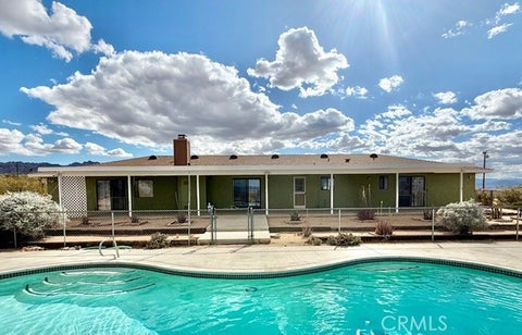 Photo of 6425 Indian Cove Road, 29 Palms, CA 92277 (MLS # JT26057157)