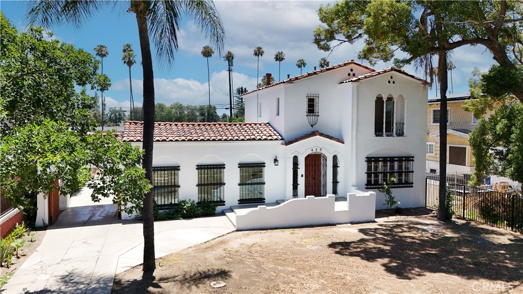 Stunning Remodeled Colonial Spanish-Style Home in Prime San Bernardino Location!
Welcome to this beautifully remodeled two-story Colonial Spanish-style home with tile roof,
perfectly blending timeless charm with modern upgrades and unbeatable functionality. Located
in a desirable San Bernardino neighborhood, this expansive 2,200 sq ft residence sits on a
generous 12,000 sq ft lot — offering ample space to entertain, relax, or even build your dream
pool for those warm California sunny days.
Step inside the main home and enjoy fresh new flooring, brand-new dual-pane windows, and
fresh interior and exterior paint. The fully remodeled kitchen features elegant with nice cabinetry and beautiful
countertops, designed for both style and practicality.
What truly sets this property apart is the incredible flexibility it offers: an Accessory Dwelling
Unit (ADU) with 2 spacious bedrooms, perfect for rental income, extended family, or guests —
plus a Jr. ADU, ideal for a home office, studio, or additional rental opportunity.
The gated lot offers privacy and security, with a huge front driveway providing plenty of
parking. Need space for work trucks or business vehicles? Take full advantage of alley access
and extra parking space in the back — perfect for contractors, small business owners, or RVs.
This property is a rare find, combining classic architecture, modern comfort, and incredible
income potential with plenty of parking space — all in one of San Bernardino’s most sought-
after areas.