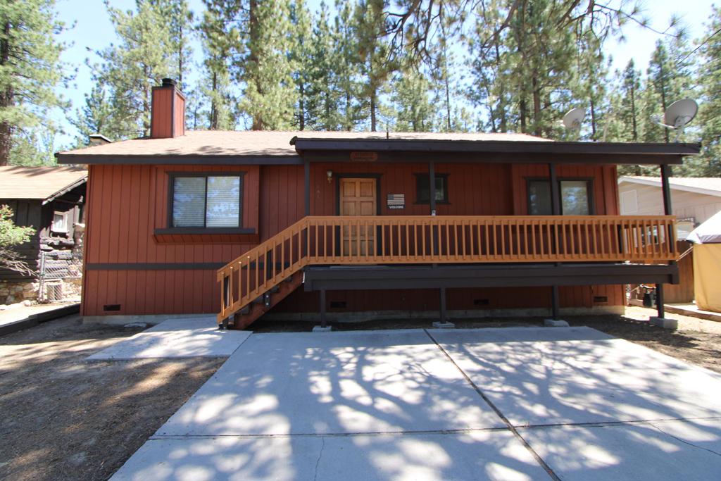 Minutes to both Big Bear Mountain, Snow Summit Ski Resorts & Big Bear Lake.Discover a multitude of winter and summer activities within close proximity. This delightful 2 bedroom, 2 full bath well cared for home offers the perfect blend of cozy mountain living ideal for a weekend getaway, vacation rental, or year-round residence.A wood-burning fireplace in the living room creates a warm and inviting atmosphere, perfect for snowy Big Bear evenings. Enjoy the serenity of the fully fenced backyard. Lay in the hammock or throw some horseshoes.