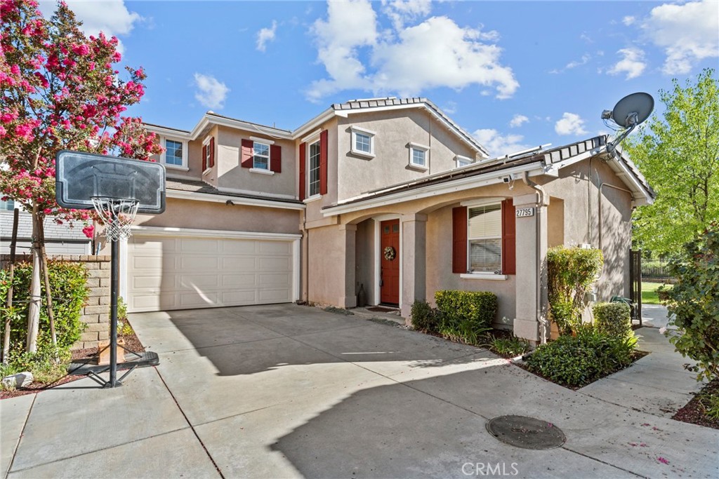 One of the Largest Backyards with a View – Prime Lot in Creekside! Welcome to one of the most desirable parcels in Valencia’s sought-after Creekside community! This beautifully maintained 3-bedroom + office (optional 4th bedroom) home sits on a premium lot with one of the largest backyards in the neighborhood, backing directly to the bike trail with sweeping, unobstructed views — a rare find that truly stands out. Inside, enjoy a light-filled, functional layout designed for both entertaining and everyday comfort. The formal living and dining rooms are perfect for hosting, while the cozy family room with a fireplace opens to a well-equipped kitchen featuring a center island, ample cabinetry, and generous counter space. Upstairs, the spacious primary suite offers a walk-in closet and private bath with dual sinks, a soaking tub, and separate shower. A convenient upstairs laundry room and a versatile downstairs office—ideal as a 4th bedroom—add flexibility to the floorplan.
Notable upgrades include contemporary tile flooring in all main living areas and classic plantation shutters throughout. But the real showstopper is the backyard: a huge, private space with mature landscaping, a tranquil water feature, and a full-length covered patio—perfect for relaxing or entertaining. Concrete side yards provide easy maintenance and extra usability.
As part of the Creekside lifestyle, you’ll enjoy two sparkling pools, an inviting spa, green spaces, playgrounds, and access to Valencia’s scenic paseos and bike trails—all just steps from your door. Plus, you’re within walking distance to Valencia High School, and close to shopping, dining, and commuter routes. All this—and best of all, No Mello Roos! Schedule your private showing today!