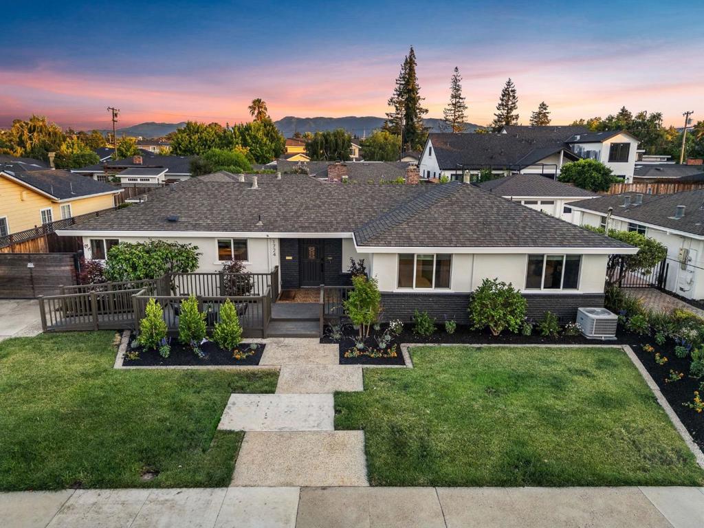 Welcome to your own slice of Willow Glen perfection. Private and peaceful, yet just minutes to downtown, top-rated schools, and all the activities you love. Stunning modern interior with high-end finishes throughout. The kitchen is a showstopper, featuring custom cabinetry and premium Thermador appliances. Two beautifully updated bathrooms showcase classic black and white accents, a luxurious soaking tub, a large walk-in shower, and a dual vanity. Flexible floor plan offers three spacious bedrooms, including a guest room with a built-in Murphy bed, plus a detached office complete with its own mini split system - perfect for working from home or creative projects. Out back, your own private resort awaits. Enjoy a sparkling blue swimming pool with ledge loungers, a six person cal spa hot-tub under a gazebo, and a generous 200+ sqft tiled lanai for effortless indoor/outdoor living. A detached workshop with multiple 220V outlets is ready for any hobby or passion project. Set on an expansive 8,712 sqft lot with an electric gate, a two-car carport with extra storage, and plenty of space to spread out and enjoy. This place is dialed in and ready to go! Dont miss this Willow Glen gem!