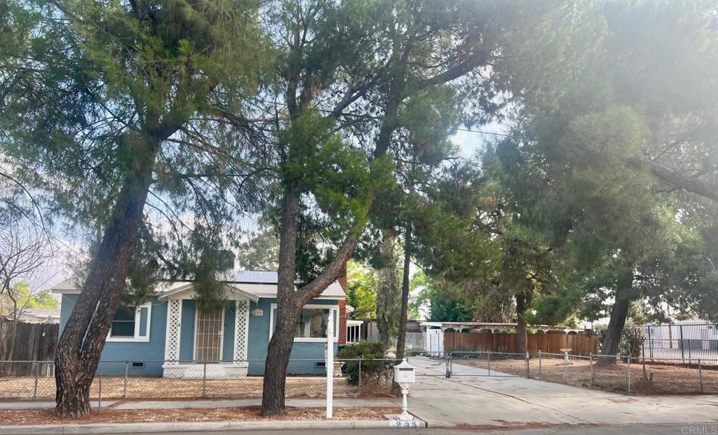 Cute home on over 1/3 of an acre with an amazing inground pool! Very roomy kitchen, Laundry room, Beautiful raised hearth rock fireplace, Main bathroom had recent remodel, Central heating and air, and also a evaporative cooler. Huge area in the back for RV parking or a huge garden! There is even an outdoor dressing room and shower for the pool! There are 2 storage sheds in the back also, So many possibilities for this property! The 2 car garage has been converted to living space but there is also a carport. Lovely pine trees give the front area a parklike feeling! This is a unique and special property!