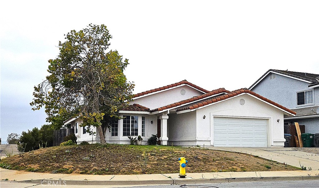 Rare single-level home on a corner lot in one of Nipomo's most sought-after neighborhoods. This 3-bedroom, 2-bathroom house features new carpet and flooring, updated kitchen appliances, quartz countertops, ceiling fans, a spacious two-car garage, indoor laundry, and a cozy fireplace. The interior has been freshly painted and is move-in ready! At 1,904 sq. ft., this home is larger than most in the area.