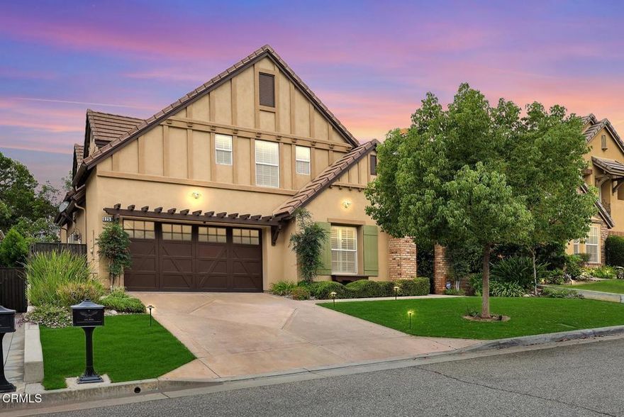 Welcome to this magnificently reimagined Tudor estate, originally built in 2009 and now exquisitely remodeled with approximately $350,000 in upgrades. Nestled within the prestigious Estates Pasadena enclave, this residence embodies timeless grandeur blended with modern refinement.A stately approach sets the tone with elegant landscaping, drought-conscious turf, a slate pathway, and four brick arches crowned by a wooden trellis, creating a dramatic procession to the oversized entry door.Inside, soaring 18-foot vaulted ceilings frame the living room, illuminated by a designer chandelier. At the heart of the home, the chef's kitchen features a massive quartz island, custom dovetail soft-close cabinetry, Thermador appliances, and a spacious pantry. Seamlessly connected to the great room with fireplace and garden views, this space is ideal for entertaining. A newly designed butler's pantry with dual wine refrigerators, quartz counters, and illuminated cabinetry ensures effortless service. The breakfast area, enhanced by a golden chandelier, opens directly to the backyard for al fresco dining.The main level also offers a refined junior suite with new bath, an office with custom cabinetry and sliding doors to the outdoors, and elegant living spaces enhanced by new wood flooring.Upstairs, the primary suite is a retreat of extraordinary scale with coved ceilings, recessed lighting, and dual custom closets. The spa-inspired bath features a freestanding soaking tub beneath a chandelier, an expansive rain shower with seating, and dual quartz vanities with hidden outlets. A second junior suite and versatile family room--ideal as a fifth bedroom or gym--complete the upper level.The grounds are equally impressive, designed for both beauty and function. An expanded paver patio accommodates full outdoor living and dining, while mature hedges and specimen trees ensure privacy. Artificial turf conserves water, complemented by new exterior lighting, advanced drainage systems, and fresh exterior paint with a lifetime warranty.Centrally located in Pasadena, this estate represents a rare opportunity to acquire a 2009 architectural classic thoughtfully elevated for today's lifestyle--a masterful blend of heritage, luxury, and enduring value.