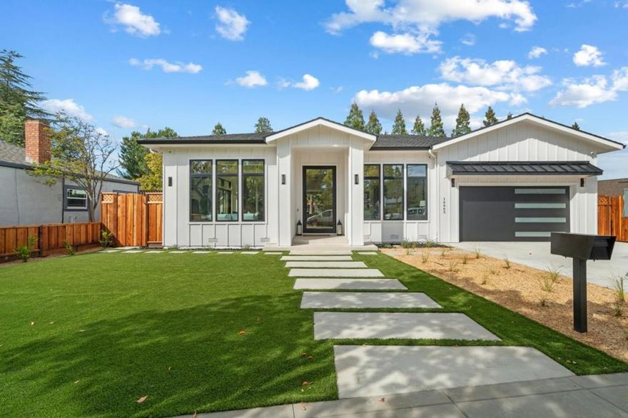 STATE-OF-THE-ART NEW HOME | Completed in 2025, this spectacular tech home in a private, highly coveted neighborhood boasts a single-level layout that exudes indoor-outdoor versatility. Oversized casement windows, ceilings of up to 15, and a folding wall of glass to the spacious rear veranda create breezy, casual elegance throughout. Grand open-concept gathering areas, a climate-controlled wine cellar, butlers pantry, and showstopping gourmet kitchen present lavish entertaining opportunities. All bedrooms are ensuite, including a potential home office and an ADU complete with kitchenette, laundry, and private entry ideal for multigenerational residents. The veranda overlooks a newly landscaped backyard with patio, turf, and play court. Highlights include a palatial primary suite, 7kW solar power system, high-end appliances, and state-of-the-art surround sound and camera features. Stroll or bike to Blossom Hill Park and prized Los Gatos schools like Van Meter Elementary and Fisher Middle (buyer to verify). Within moments of Vasona Lake, hiking, freeways, and downtown shopping, dining, and entertainment.