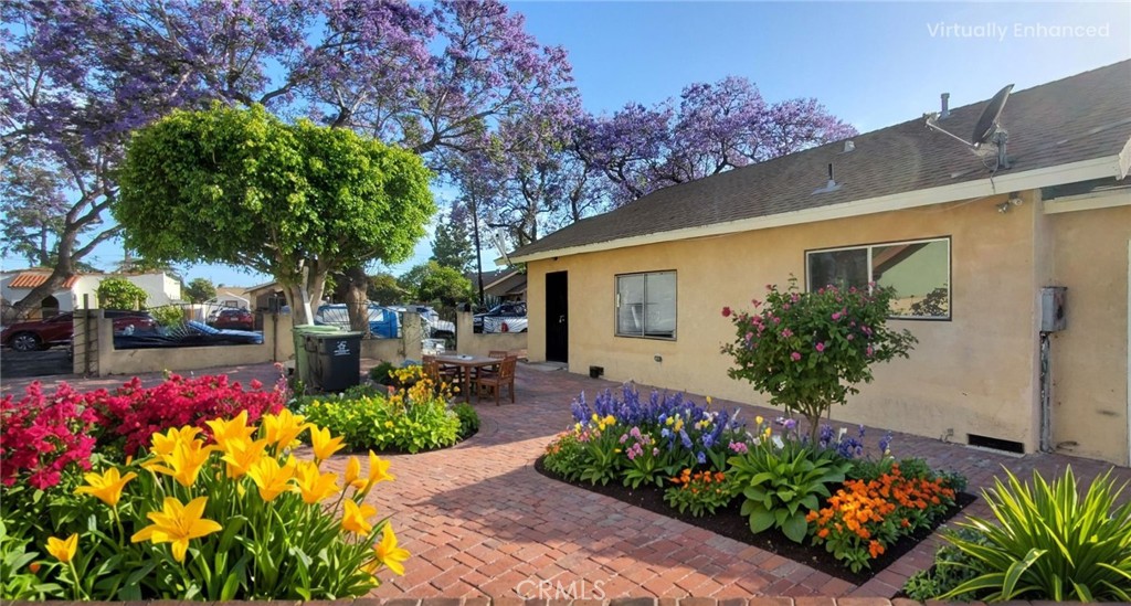 BACK ON THE MARKET at no fault to seller - Buyer unable to close escrow on their other 1031 replacement sales.
CREATIVE FINANCING options available. SELLER FINANCE, Seller may carry existing loan. Creative terms welcome!
Ideal for Multi-Generational Living – Comfort, Privacy in a SAFE neighborhood.
This perfectly designed property offers multiple private living spaces ** Live in one house, rent the other TWO residences. Rent will pay for your mortgage.
Turnkey Investment ** STRONG 5% Cap Rate, Enjoy solid returns $107,000+ annual income from day one based on current rents, with room for upside through rent increases. Reach CAP rate - Upto 8% CAP with NEW ADU ** Reliable tenant already in place, paying over market rent, the past 3 years! THREE Completely separate, DETACHED residences. Total TWO buildings STAND ALONE, completely DETACHED. SEPARATELY metered for gas, electric and water. Each has its own mailing address: 1001 & 1003 W Myrtle. Nine (9) spacious rooms, 4 Full Bath, 3 Full Kitchen & 5 car garage. Total 14 parking spots on this HUGE 10,000 lot ** In 2022 MAJOR REMODEL for ALL buildings was done, NEW windows, NEW floors everywhere, NEW kitchen & bathroom cabinets. You can ADD ** an ADU in the 3-car garage and build an addition to the front house in the 2-car garage. You will end up with FOUR completely detached, separate residences, bringing in ADDITIONAL rent approx. $40,000 annually only from ** ADU** Seller has APPROVED PLANS from the city & Building PERMIT for ADU (see supplements) Will be TRANSFERRED at NO additional cost. IN 1986, BACK house SFR was build split into 2 residences from inside. Original FRONT single family residence is one SINGLE story, completely DETACHED with 2 beds & 1 FULL Bath, front, side and backyard. One of the strongest rental markets in So Cal. The City of Santa Ana is a historic city w/ vibrant downtown located in OC. Even with only a 3% rent increase - you will end up with over $3,500 additional rent each consecutive year. CENTRALLY located, close to downtown, transportation, schools, shopping & park. MAJOR freeways 22,5,57. Please DO NOT go direct, do not disturb tenants. Offers subject to interior inspection. All rooms, landscape are virtually staged. Must see in person to appreciate the flow and floor plan. Front House is the original that was built in 1936 and MAJOR remodeling was done in 2022. Neighborhood views from surveys: they would walk alone at night. Ask for PROPERTY VIDEO and rental cash flow.
