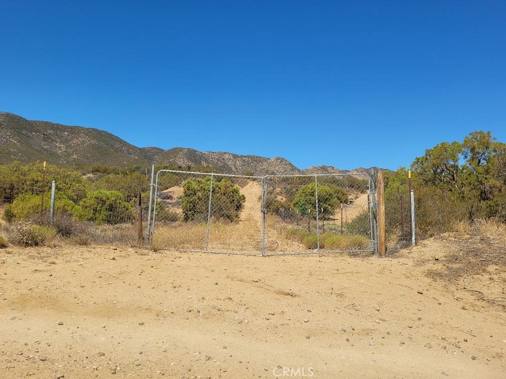 TWO separate Parcels being sold together for a total of 5 Acres on Gated Frontage on Terwilliger Road. Parcel #062 has permitted well and power.
Both Properties also have a C.O.C for the County as a certified parcel to make it easier for building a home.
The views all around these parcels are amazing and panoramic. This property is very close to hiking and biking trails and even the Pacific Crest Trail.
You have starry nights with no light smog and no smog smog either.... No industry up here in this quiet country area of the Anza Valley.
An elevation of 4062 gives you multiple options for veggies and fruit/nut trees. Endless possibilites
With two parcels you could keep one and sell one they are completely separate.
Lots of room for multiple homes, warehouse, arenas, workshop, gardens, and so much more.
A 40 Minute drive to Palm Desert, Palm Springs, Temecula or Hemet and a peaceful 20 minute-ish drive to Idylwild.
You will want to see these pieces.