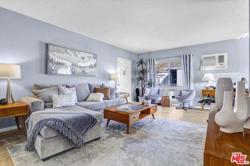 Beautifully updated FURNISHED (or unfurnished) co-op in the heart of Woodland Hills. This coutyard setting unit has new floors, new appliances, new paint a large balcony facing the pool. The large gated complex includes landscaped grounds, 2 resurfaced, solar heated swimming pools, children's play structure, basketball court, BBQ area, putting green, and a recreation room with a full kitchen. HOA fee includes property tax, earthquake insurance, water, hot water, trash, sewer, property taxes, and all exterior maintenance. Full time maintenance crew and on-site office manager. Just minutes away from The Village, Topanga Social, Westfield Promenade, Amazon Fresh, Costco, and many more shops, restaurants and service. Property is a co-op and has a preferred lender.