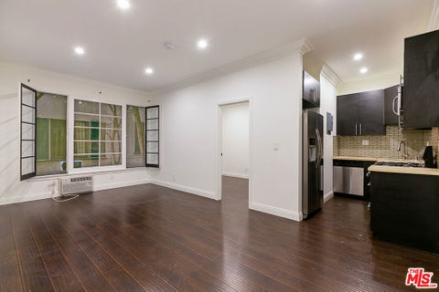 Photo of 7223 Willoughby Avenue #106, Los Angeles, CA 90046 (MLS # 26999589)